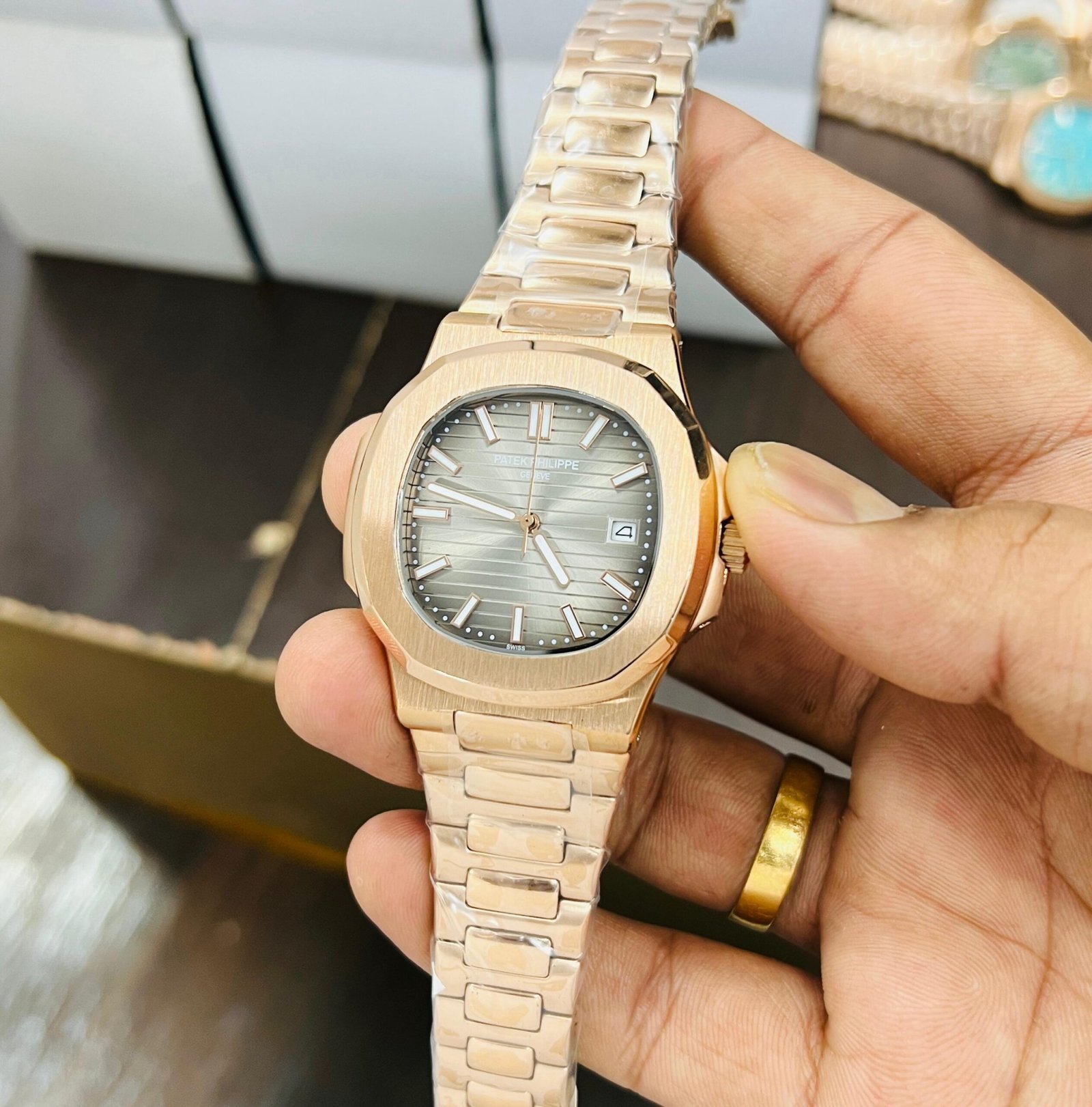 rn-image_picker_lib_temp_761da848-e86c-4a6f-8d44-b3676fed2c7a Pp Premium Nautilus watch - AmazingBaba